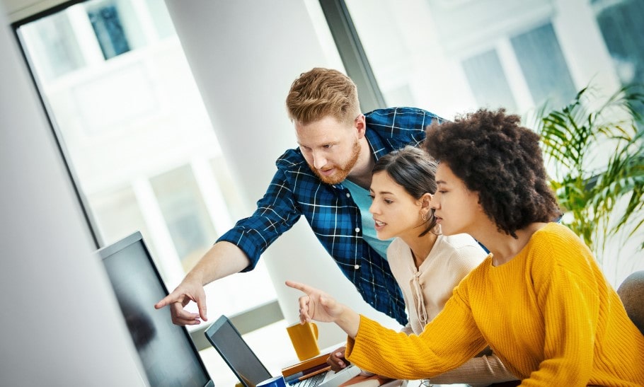 An app developer working with a client on app development.