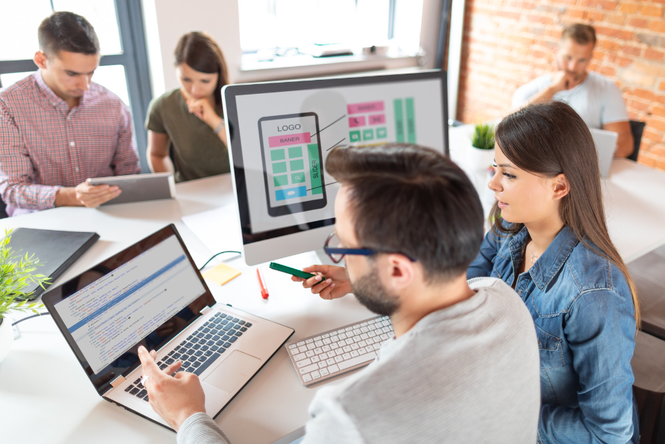 A mobile app developer discussing their app with a customer